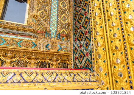 Sunlight catches mirror glass, painted surfaces, and gold edges across the temple exterior. Each close crop emphasizes texture, shine, and depth. Sunlight catches mirror glass, painted surfaces, and gold edges across the temple exterior. Each close crop emphasizes texture, shine, and depth. 138831834
