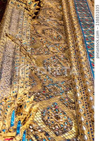 Sunlight catches mirror glass, painted surfaces, and gold edges across the temple exterior. Each close crop emphasizes texture, shine, and depth. Sunlight catches mirror glass, painted surfaces, and gold edges across the temple exterior. Each close crop emphasizes texture, shine, and depth. 138831835