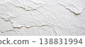 White Plaster Wall with Cracks and Textured Surface 138831994