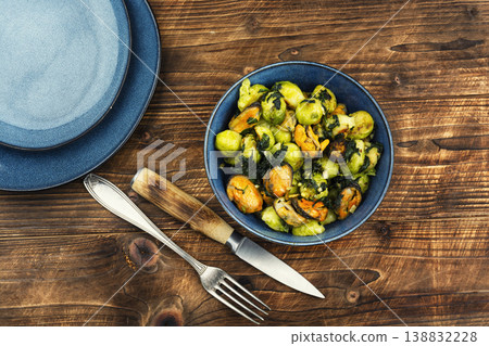 Brussels sprouts with mussels on a plate Brussels sprouts with mussels on a plate 138832228