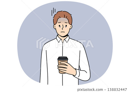 Tired business man suffering from exhaustion and burnout and holding paper cup of coffee in hands Tired business man suffering from exhaustion and burnout and holding paper cup of coffee in hands 138832447