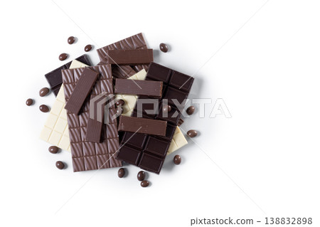 Assortment of white, milk and dark chocolate pieces isolated on white background Assortment of white, milk and dark chocolate pieces isolated on white background 138832898