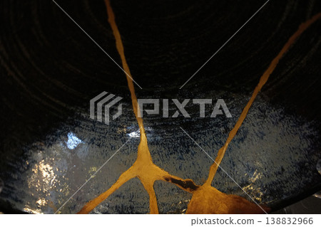 kintsugi gold repaired ceramic bowl detail kintsugi gold repaired ceramic bowl detail 138832966