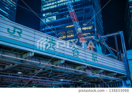 Shibuya Station at night: High-rise buildings and Miyamasu Overpass Shibuya Station at night: High-rise buildings and Miyamasu Overpass 138833098