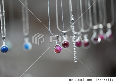 many necklages hanging jewelry detail many necklages hanging jewelry detail 138833115