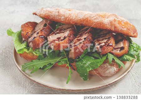 sandwich with duck breast and arugula, balsamic sauce, on a light plate, breakfast, homemade, no people, sandwich with duck breast and arugula, balsamic sauce, on a light plate, breakfast, homemade, no people, 138833288