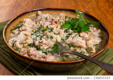 Muzhuzhi, a Georgian dish made from pork legs, with spices and herbs, homemade Muzhuzhi, a Georgian dish made from pork legs, with spices and herbs, homemade 138833325