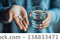 Taking Pills with Water, Close Up of Medication and Healthcare Concept 138833471
