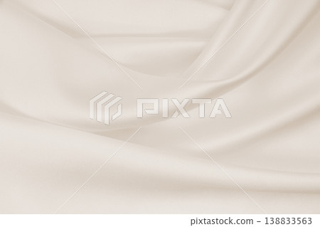 Smooth elegant golden silk or satin luxury cloth texture as wedding background. Luxurious background design. In Sepia toned. Retro style Smooth elegant golden silk or satin luxury cloth texture as wedding background. Luxurious background design. In Sepia toned. Retro style 138833563