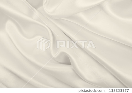 Smooth elegant golden silk or satin luxury cloth texture as wedding background. Luxurious background design. In Sepia toned. Retro style Smooth elegant golden silk or satin luxury cloth texture as wedding background. Luxurious background design. In Sepia toned. Retro style 138833577