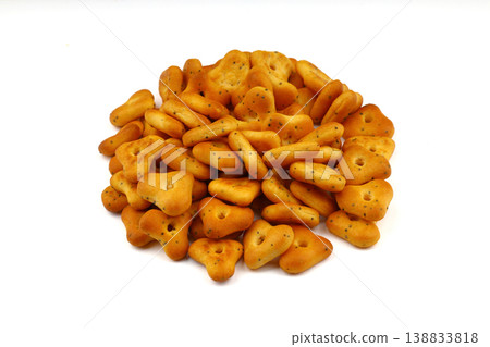 Pile of spicy triangle crackers isolated on white background, crunchy savory snack food, top view 138833818