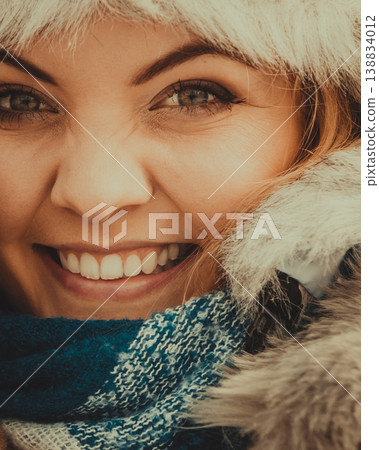 Female wearing warm outfit during winter Female wearing warm outfit during winter 138834012