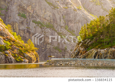 Road and fjord landscape in Norway 138834115