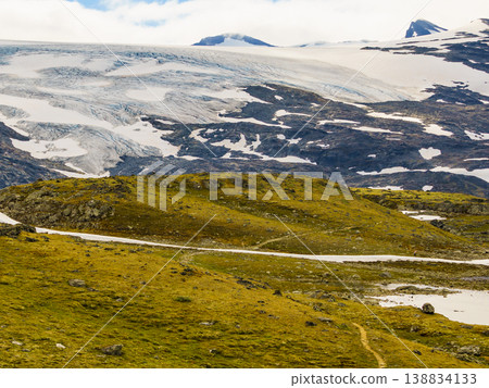 Mountains with ice glacier. Road Sognefjellet, Norway Mountains with ice glacier. Road Sognefjellet, Norway 138834133