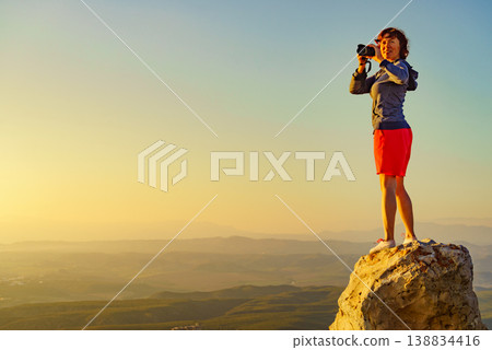 Woman with camera take travel photo Woman with camera take travel photo 138834416