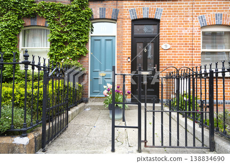 Typical colored entrance door of a house in a classic building in Dublin, Ireland Typical colored entrance door of a house in a classic building in Dublin, Ireland 138834690