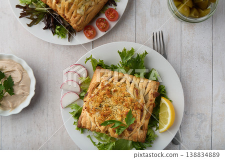 Top View Savory Stuffed Pastry with Fresh Salad 138834889