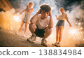 Young boy crouching with hands on ears amid fireworks, two girls in the background, smoke and sparks illuminating the night scene 138834984