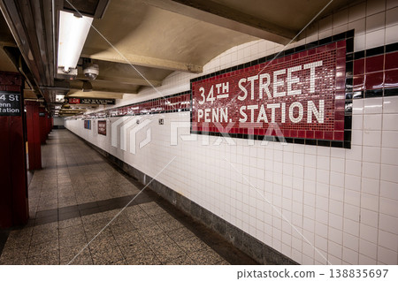 New york, usa august 15,2024. Manhattan 34th street penn station subway platform with classic mosaic tiles, empty waiting area and vintage signage, clean interior journey 138835697