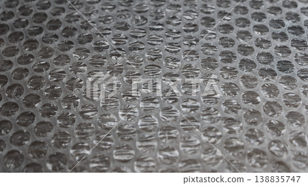 Used Bubble Wrap Sheet Angle View Textured Stock Photo. Package Material Backgrounds 138835747
