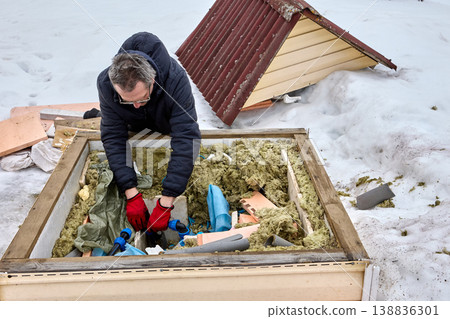 Distribution manifold with service lines in well pit homeowner installs HDPE piping using compression fittings. Distribution manifold with service lines in well pit homeowner installs HDPE piping using compression fittings. 138836301