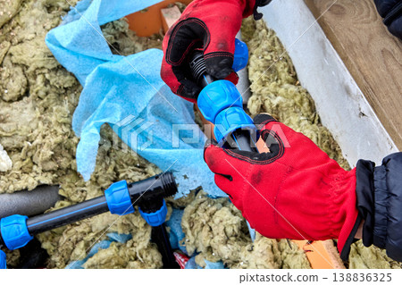 Connection of HDPE pipes using plastic compression fittings. 138836325
