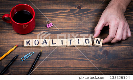 Coalition Concept With German Word Koalition Formed by Wooden Letter Blocks 138836594