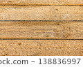 Frozen wooden boards texture in warm winter sunlight 138836997