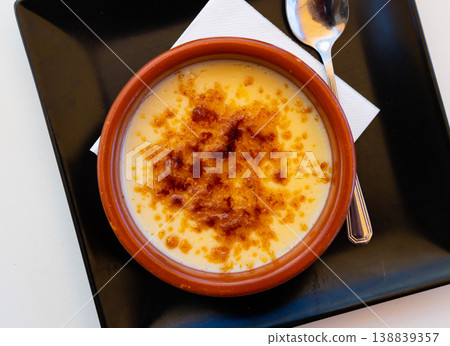 Catalan cream delicious dessert with sugar toast. Typical in Catalonia Spain Catalan cream delicious dessert with sugar toast. Typical in Catalonia Spain 138839357