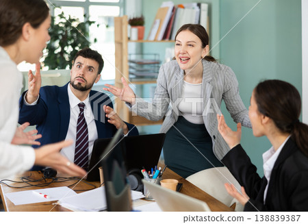 Group of men and women arguing loudly in office Group of men and women arguing loudly in office 138839387