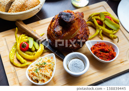 Popular dish of Austrian cuisine is roasted pork knuckle in beer sauce 138839445