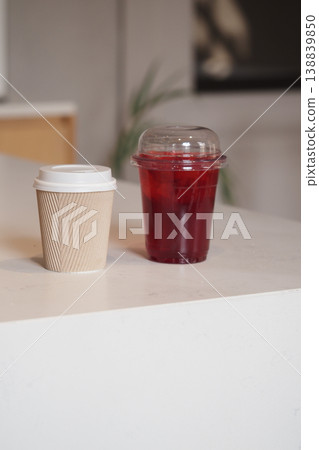 Hot drink and cold drink on a counter in a cafe Hot drink and cold drink on a counter in a cafe 138839850