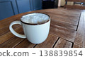 Coffee cup placed on a wooden table in a cafe 138839854
