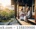 A senior couple relaxing on the veranda 138839986