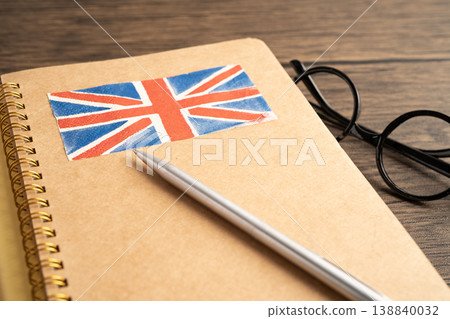 UK flag with pen on english language book. 138840032