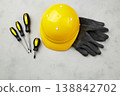 Happy labor day concept. Construction tools, yellow helmet on dark wooden background 138842702