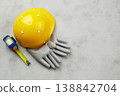 Happy labor day concept. Construction tools, yellow helmet on dark wooden background 138842704