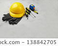 Happy labor day concept. Construction tools, yellow helmet on dark wooden background 138842705