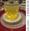 A soup served as an appetizer in a fine French restaurant | A beautifully presented dish from a multi-course meal. 138843038