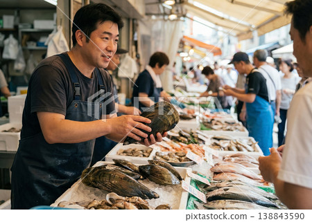 Seafood Market Vendor Holding Large Pen Shell for Sale Seafood Market Vendor Holding Large Pen Shell for Sale 138843590
