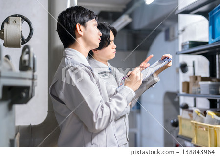 A businessman working as an equipment inspector A businessman working as an equipment inspector 138843964
