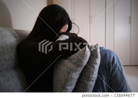 depressed woman 138844677