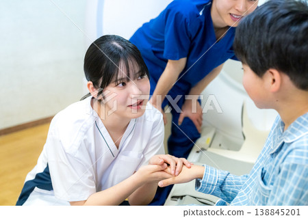 Patients undergoing CT scans and medical staff 138845201