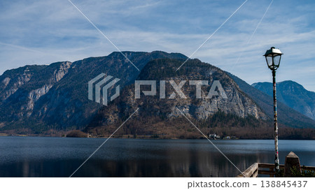 Scenic lake near Hallstatt, a peaceful escape with crystal-clear waters and majestic mountain views. 138845437