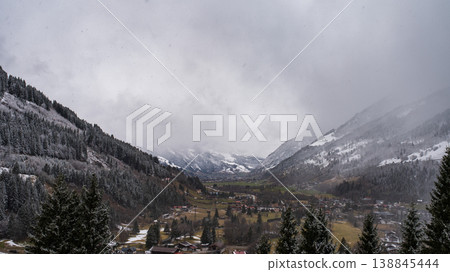 Nasty weather in the Alps. Dark cloudy sky and overcast before the rain and storm. Stormy weather. Nasty weather in the Alps. Dark cloudy sky and overcast before the rain and storm. Stormy weather. 138845444
