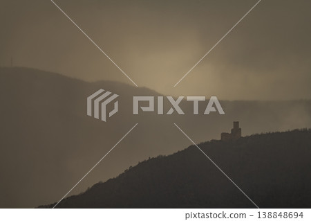 Mountain with ancient structure at sunset Mountain with ancient structure at sunset 138848694