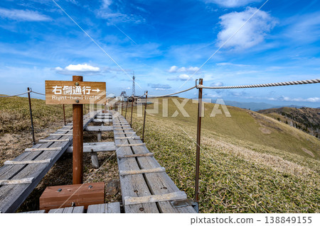 Walking trail and information sign at the summit of Mt. Tsurugi in Shikoku Walking trail and information sign at the summit of Mt. Tsurugi in Shikoku 138849155