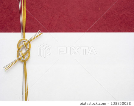Japanese-style background material: A celebratory background featuring red and white washi paper and delicate mizuhiki (decorative cords). 138850028