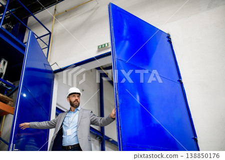 Senior industrial manager in modern factory. Senior industrial manager in modern factory. 138850176