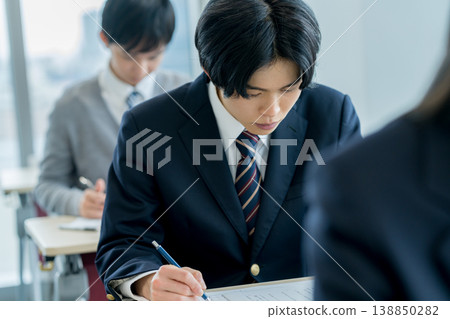 Students taking exams Students taking exams 138850282
